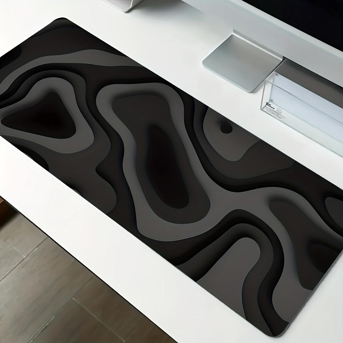 Office Furniture Brand - لوحة ماوس كبيرة بتصميم دوامي أسود